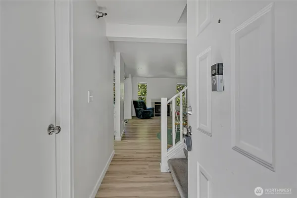 a way to rooms with wooden floor