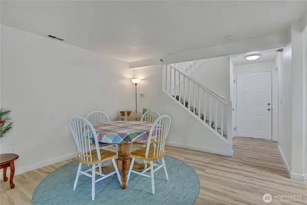 a view of a dining room with furniture