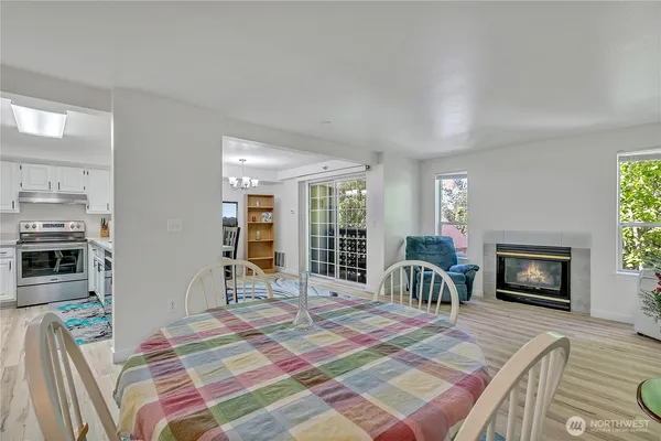a bedroom with furniture and a fireplace