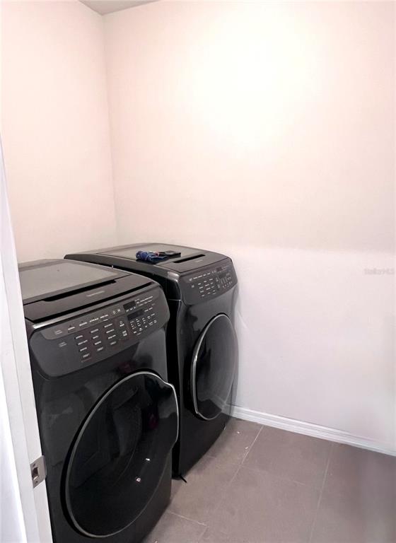 321 Blue Point Drive Ruskin, FL 33570 - Photo 12 of 18 a utility room with dryer and washer