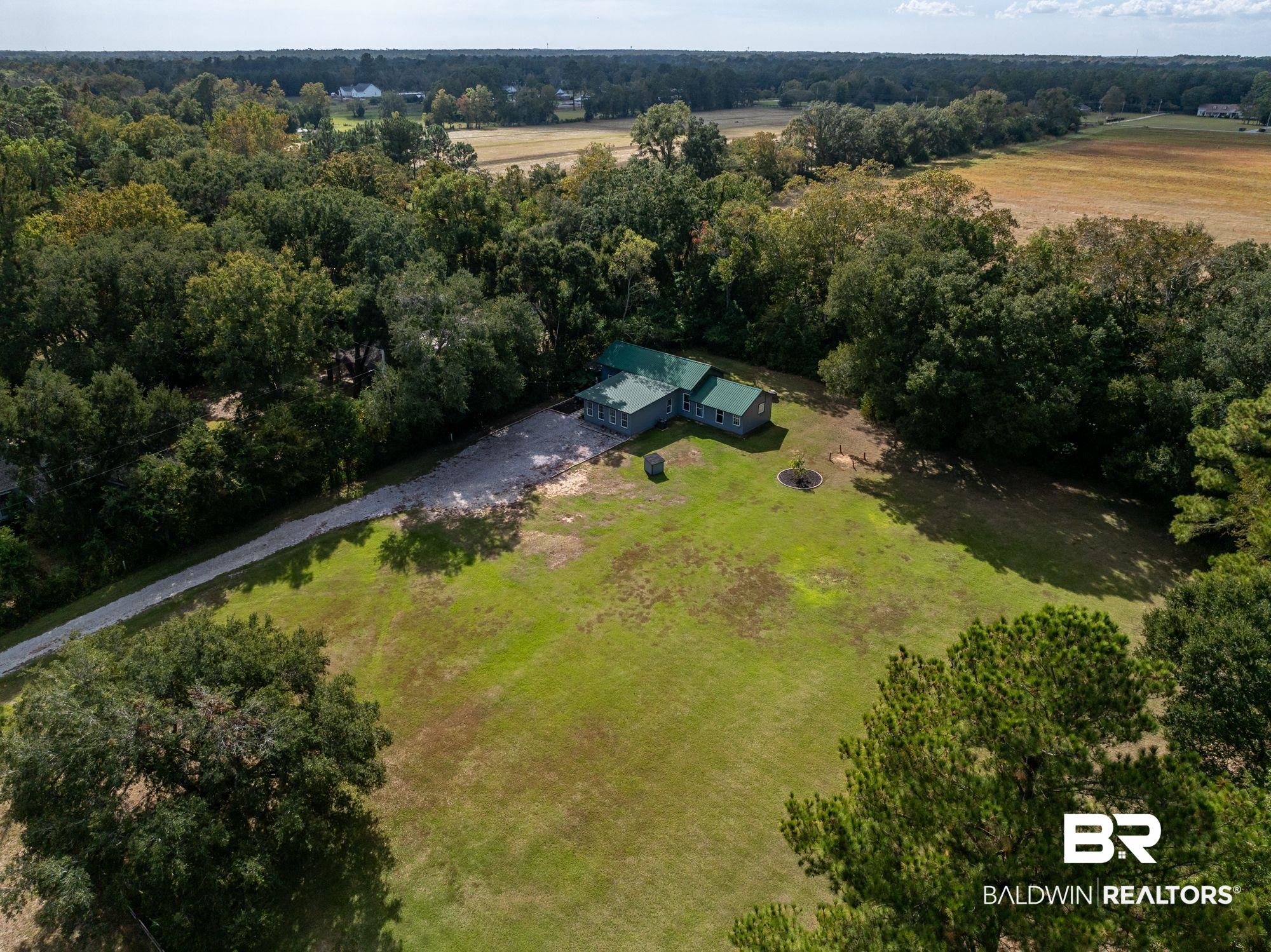 20037 County Road 33 Fairhope, AL 36532 - Photo 66 of 79 Birds eye view of property with a rural view