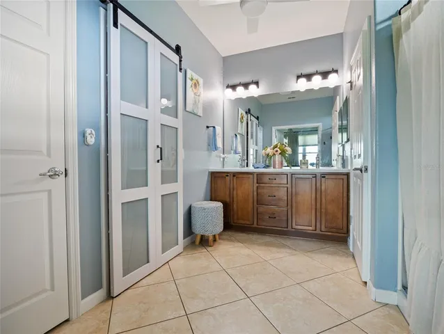 a view of a hallway with dining area