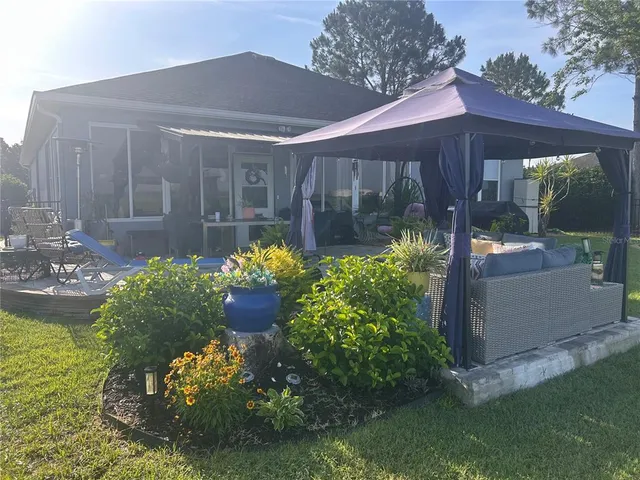 a view of a backyard with plants