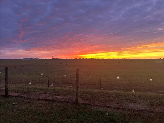 a view of a city and sunset