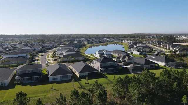 a view of a swimming pool with a lake view