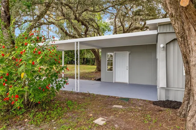 front view of a house with a trees