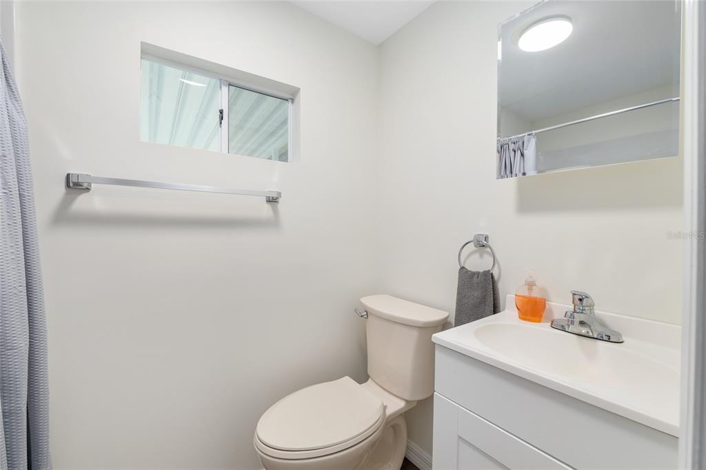 905 South Sunfish Avenue Inverness, FL 34450 - Photo 24 of 39 a white toilet sitting next to a bathroom sink