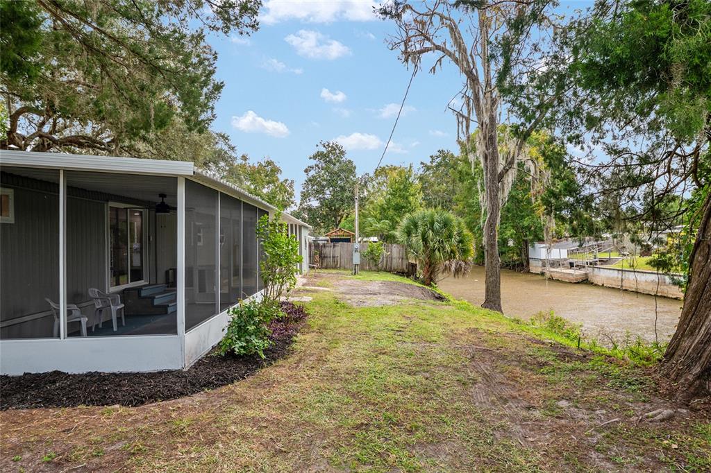 905 South Sunfish Avenue Inverness, FL 34450 - Photo 7 of 39 a view of a back yard of the house