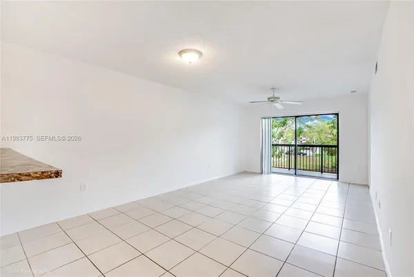 a view of an empty room and window