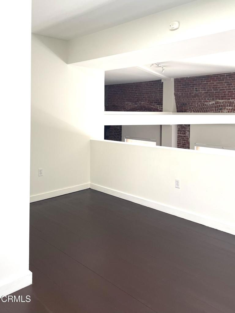 257 South Spring Street, Unit PHE Los Angeles, CA 90012 - Photo 21 of 32 a view of an empty room