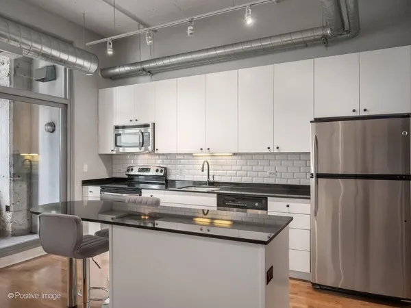 $424,900 | 565 West Quincy Street, Unit 704, Chicago, IL 60661