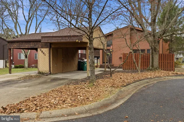 a house with trees in front of it