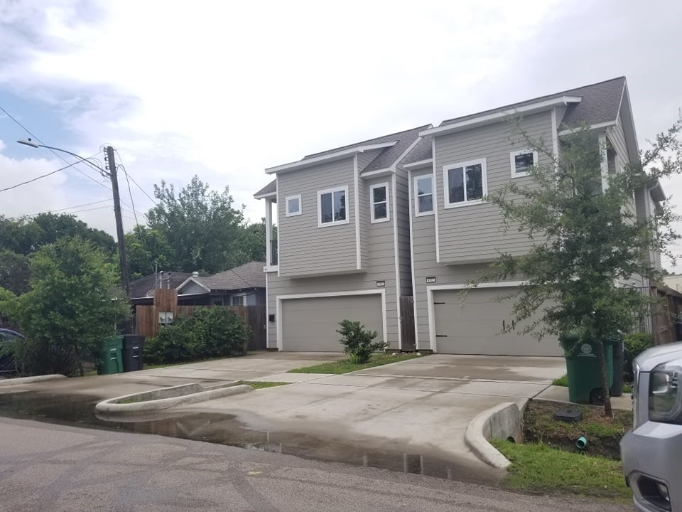 0 Nichols Street Houston, TX 77020 - Photo 12 of 20 a front view of a house with a yard and garage