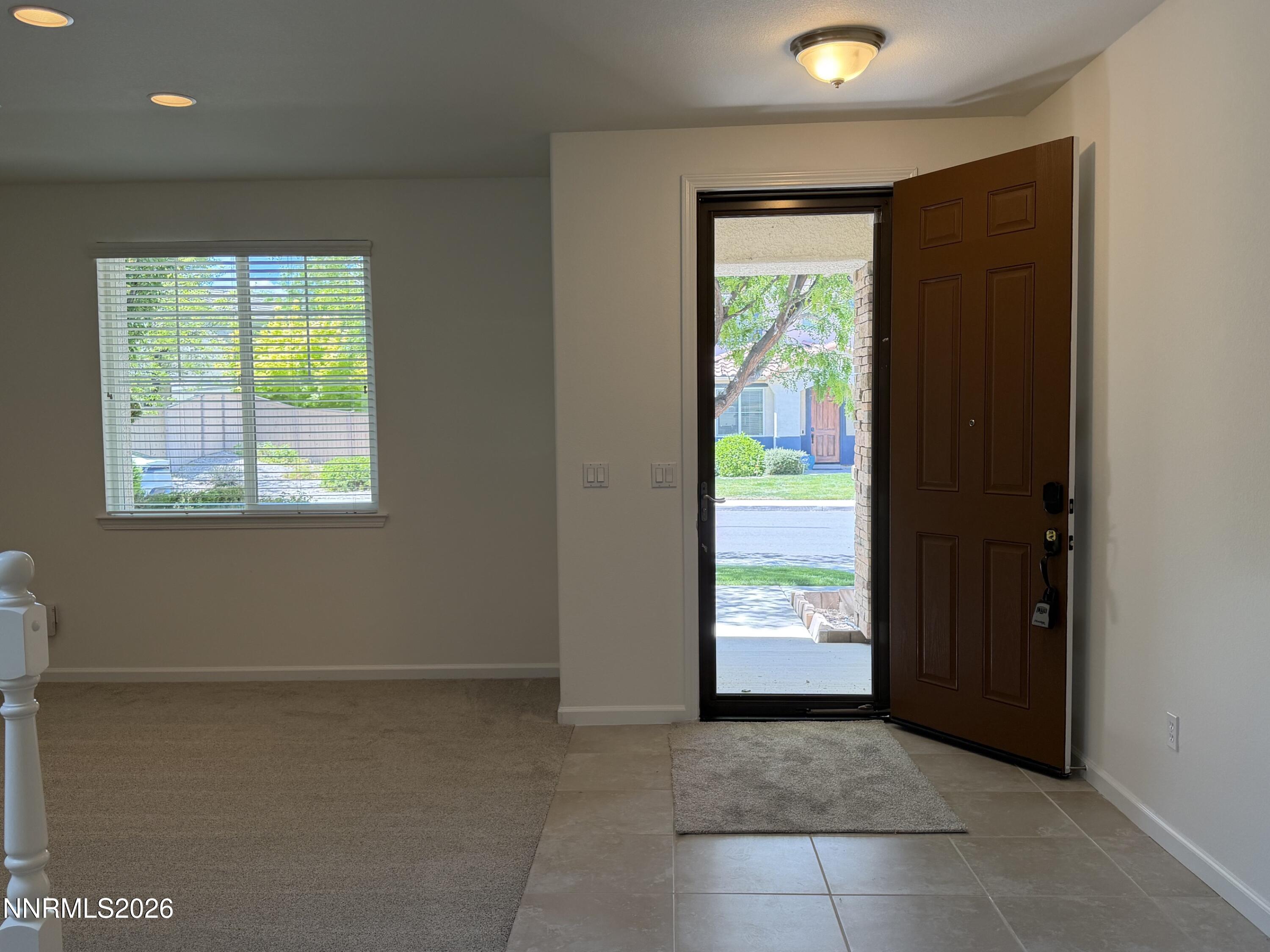 10890 Oakhaven Drive Reno, NV 89521 - Photo 24 of 28 a view of an empty room with a window