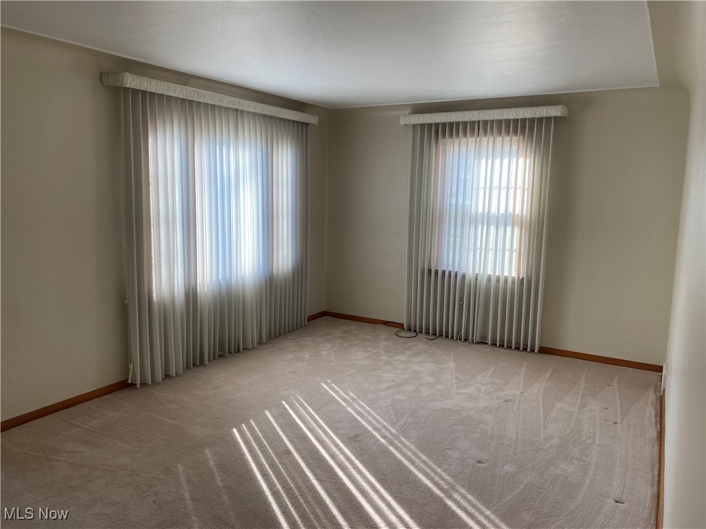 421 Omar Street Struthers, OH 44471 - Photo 3 of 31 View of carpeted spare room