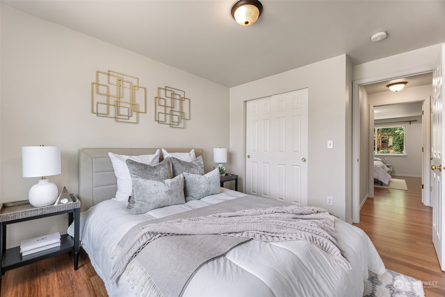 14423 Southeast 188 Way Renton, WA 98058 - Photo 23 of 40 a bedroom with a bed and a lamp