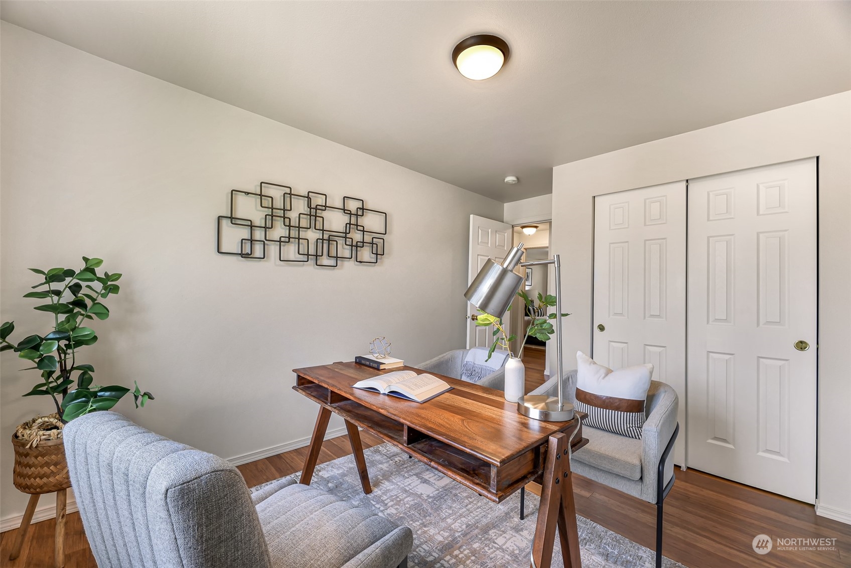 14423 Southeast 188 Way Renton, WA 98058 - Photo 26 of 40 a living room with furniture and a potted plant