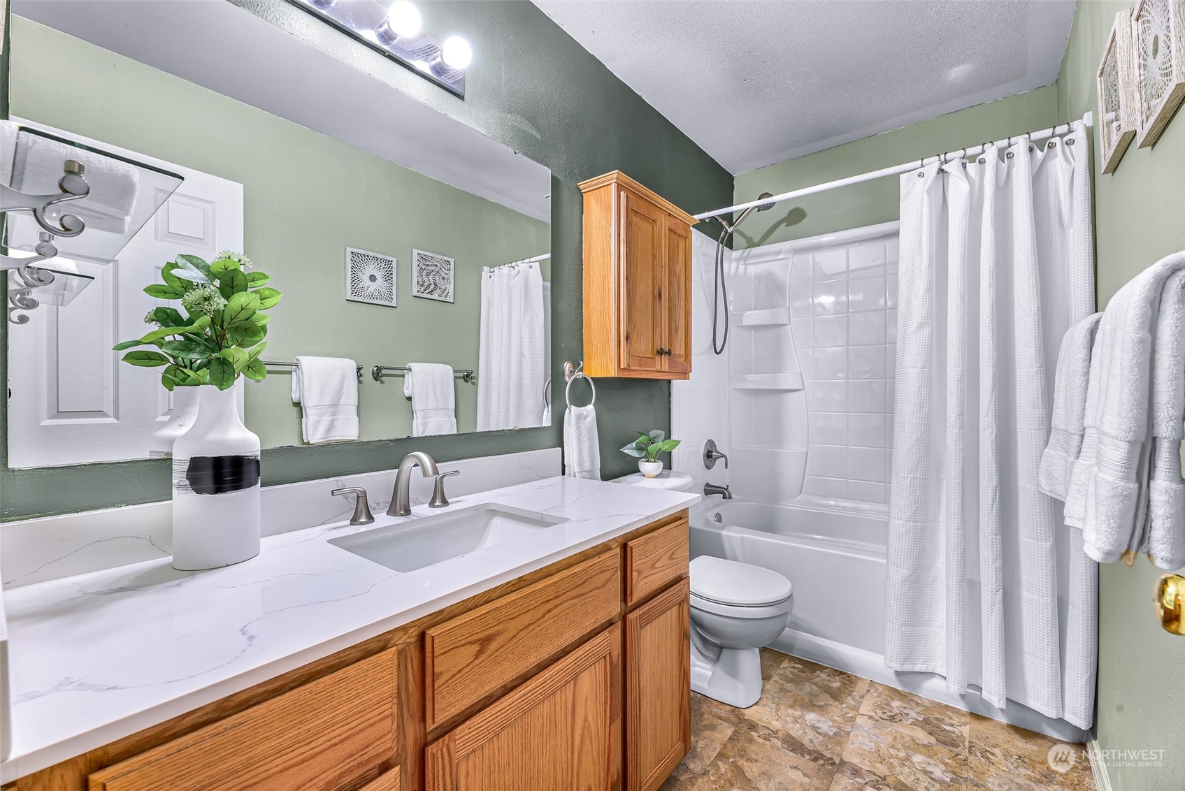 14423 Southeast 188 Way Renton, WA 98058 - Photo 34 of 40 a bathroom with a granite countertop sink a toilet and shower