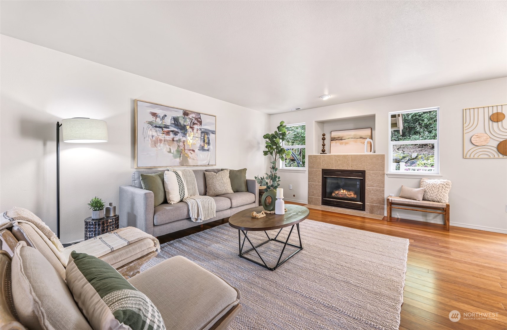 14423 Southeast 188 Way Renton, WA 98058 - Photo 5 of 40 a living room with furniture and a fireplace