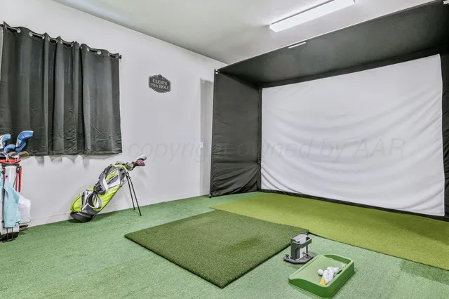 an aerial view of a house with a ocean view