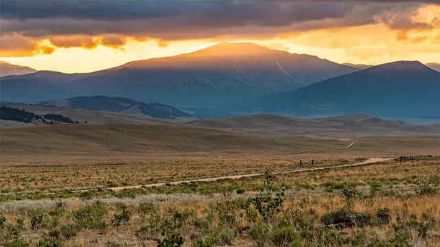a view of ocean with mountains