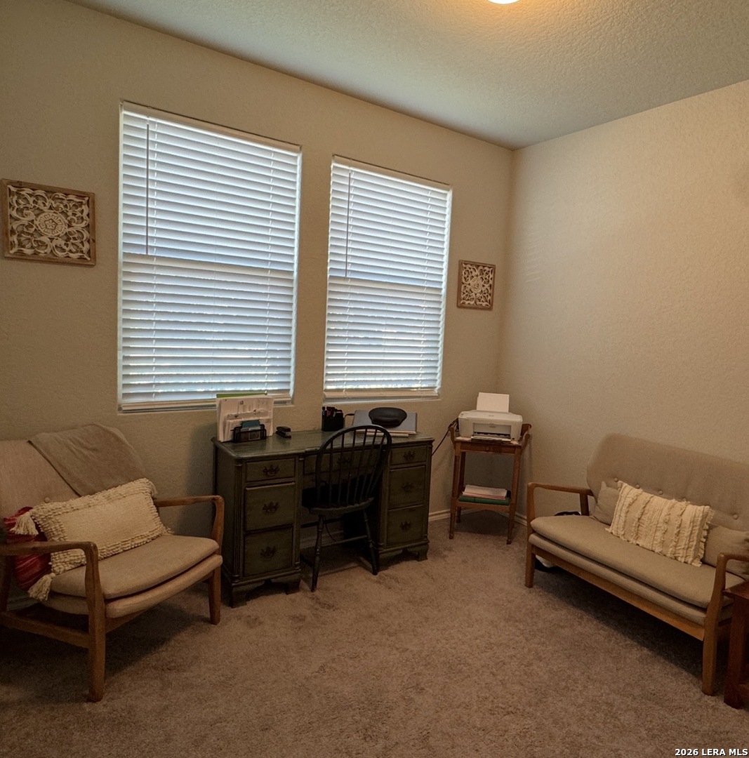 6627 Freedom Ranch San Antonio, TX 78242 - Photo 10 of 10 a living room with furniture and a window