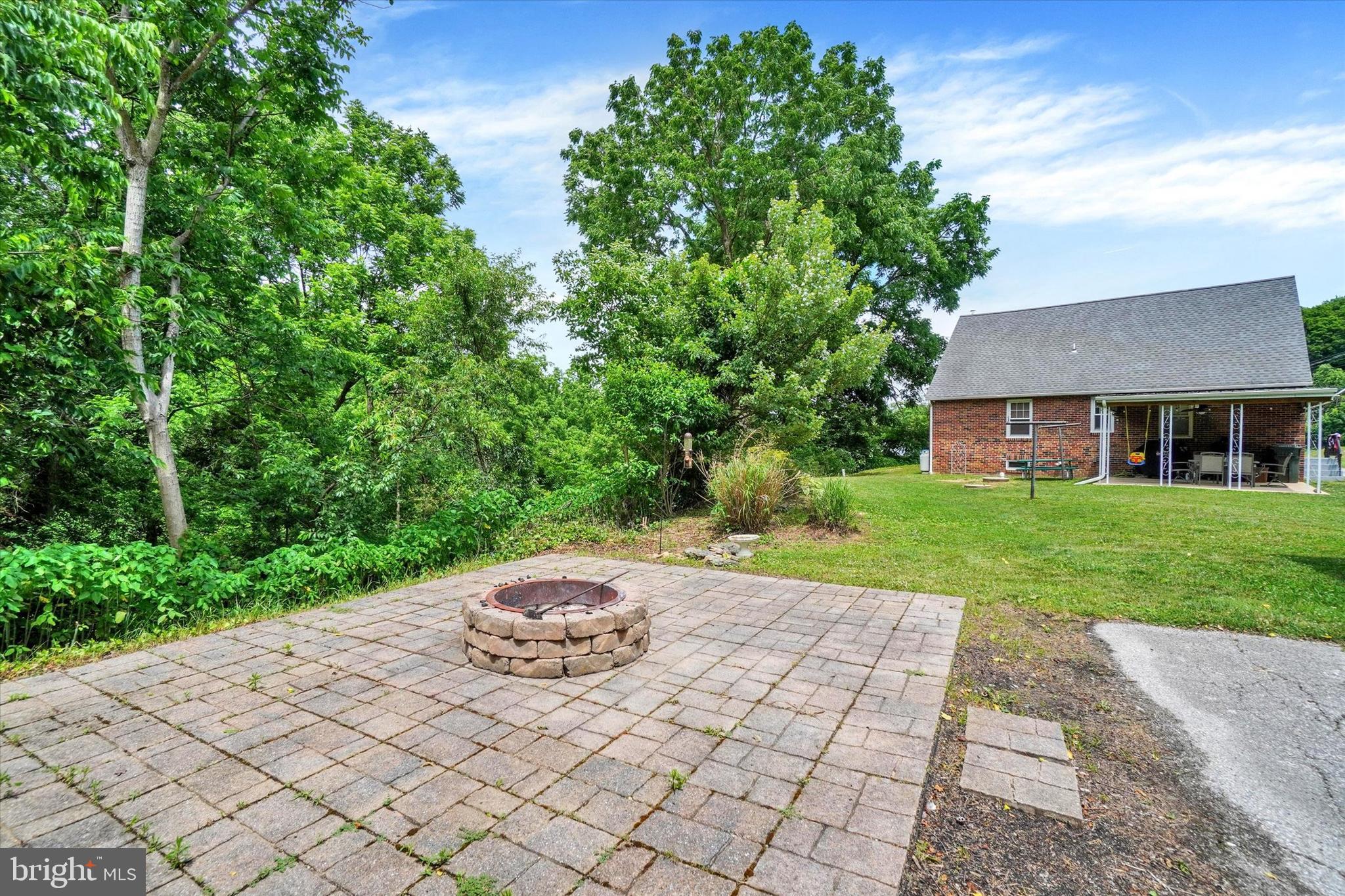 1805 Craley Road Windsor, PA 17366 - Photo 20 of 34 Backyard Firepit and pave patio