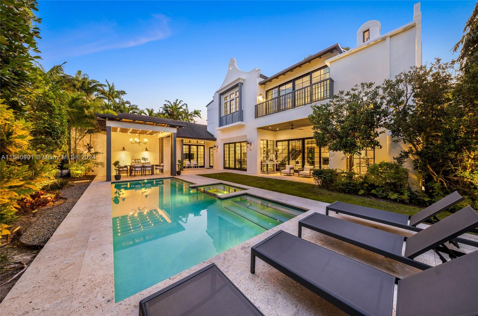 590 Northeast 59th Street Miami, FL 33137 - Photo 1 of 32 swimming pool with outdoor seating