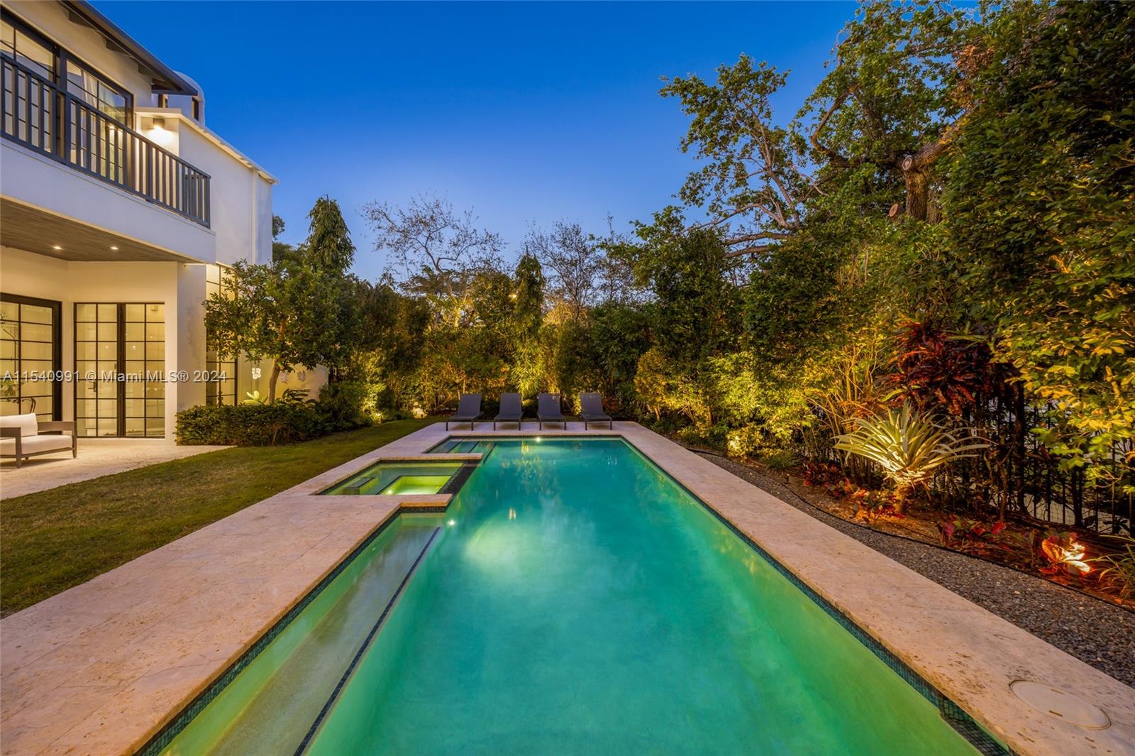 590 Northeast 59th Street Miami, FL 33137 - Photo 27 of 32 a view of swimming pool with a yard