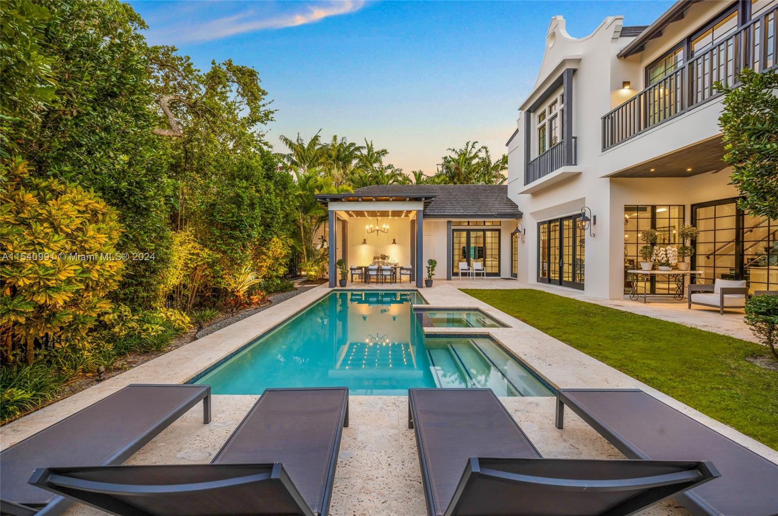 590 Northeast 59th Street Miami, FL 33137 - Photo 32 of 32 a view of a house with a swimming pool