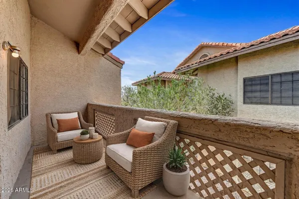 a view of backyard with seating space