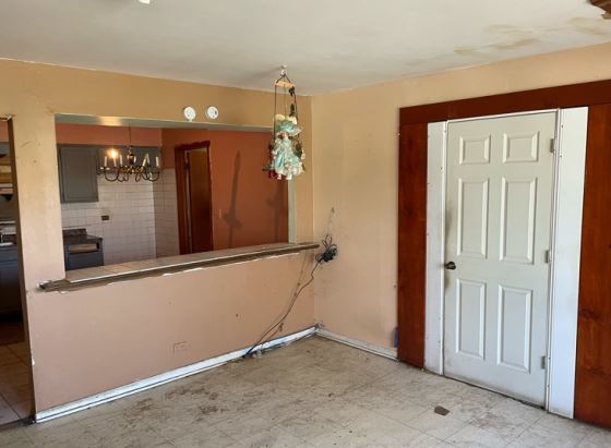 19W719 West Holtz Avenue Addison, IL 60101 - Photo 7 of 11 wooden floor and window in a room
