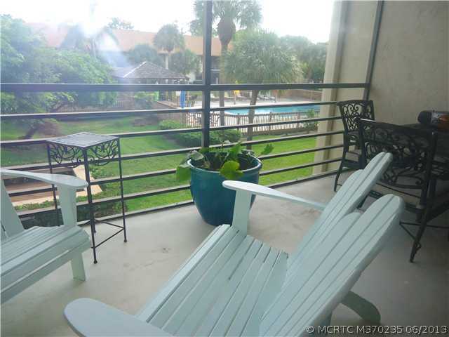 1821 Southwest Palm City Road, Unit B102 Stuart, FL 34994 - Photo 17 of 18 Other. Screened balcony overlooking pool area