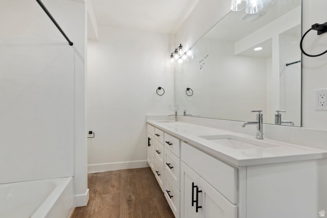 504 North 650 E Street Springville, UT 84663 - Photo 30 of 36 Bathroom featuring a dual vanity with white cabinetry, white countertops, and integrated sinks
