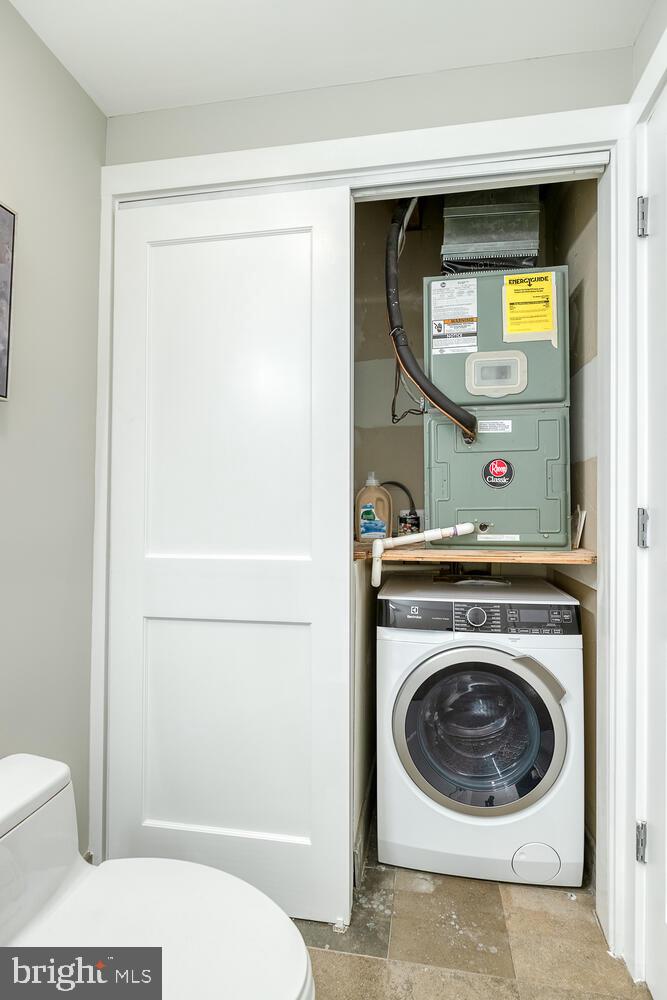 1806 Kalorama Road Northwest, Unit 1 Washington, DC 20009 - Photo 33 of 43 In-unit washer and dryer on the main level!