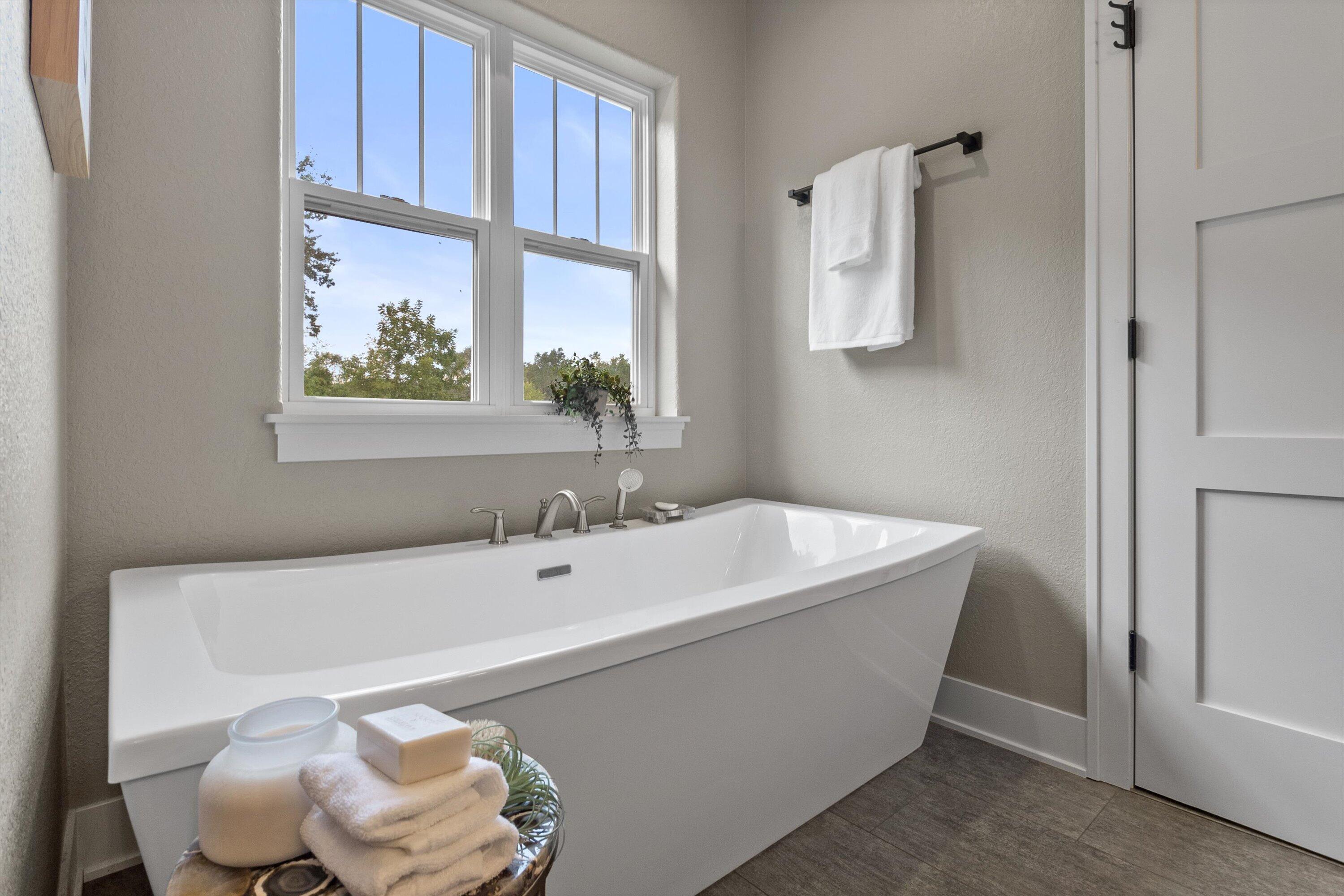 S75W35724 Wilton Road Eagle, WI 53119 - Photo 27 of 63 Soaking tub overlooks one of the home's many pastures