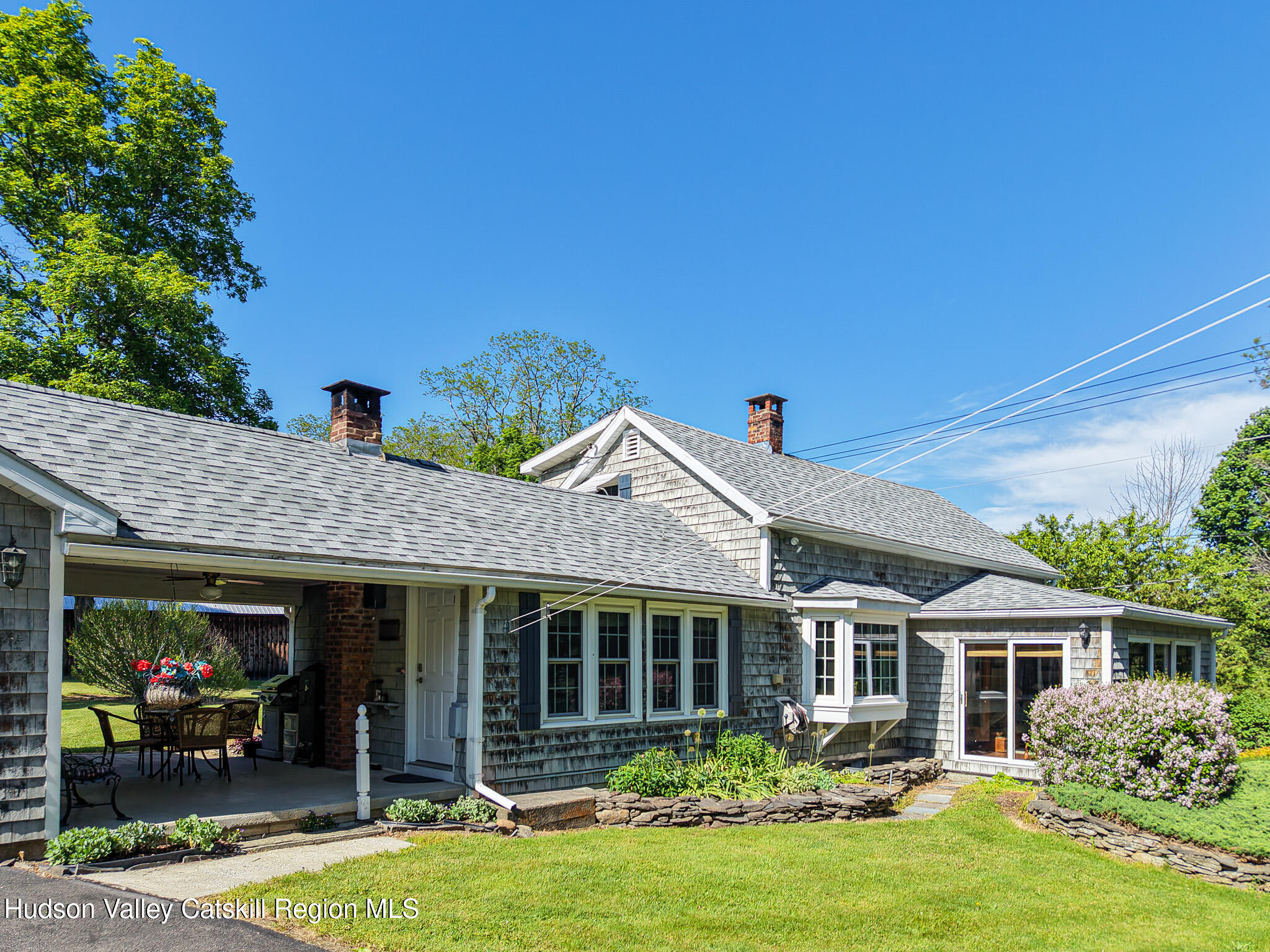 221 Camp Medusa Road Rensselaerville, NY 12120 - Photo 52 of 57 a front view of a house with garden