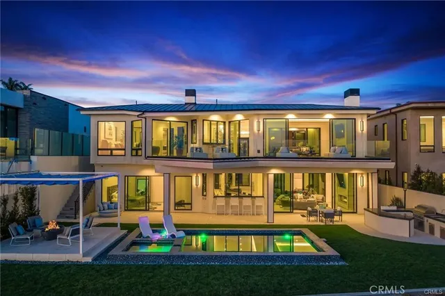 a view of an apartment with swimming pool and sitting space