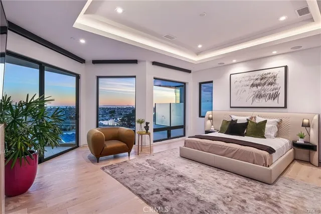 a bathroom with a bathtub a mirror and a sink