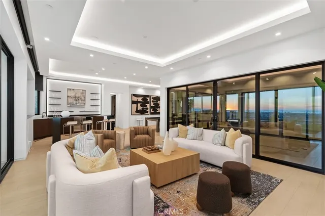 a bedroom with a large bed and a fireplace