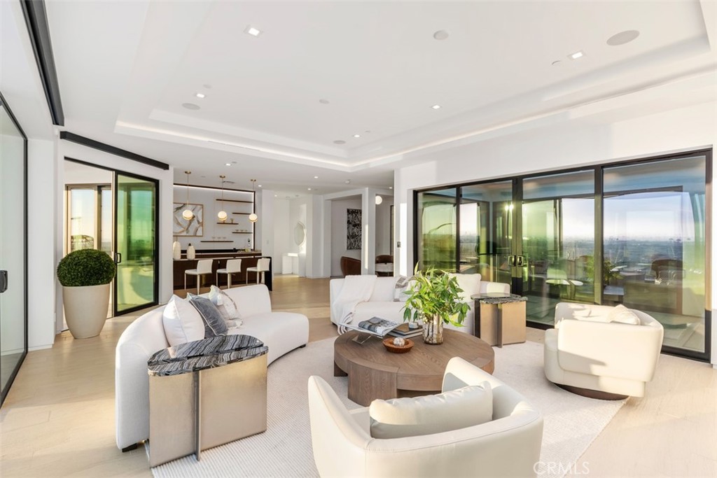 1207 Dolphin Terrace Corona del Mar, CA 92625 - Photo 48 of 58 a living room with furniture and a large window