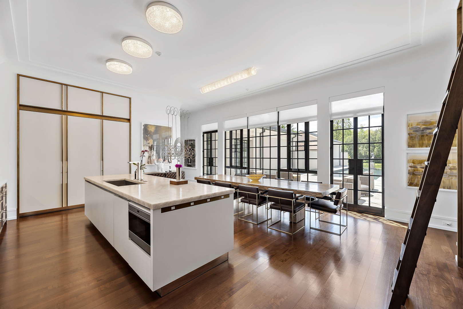 930 Lake Road Lake Forest, IL 60045 - Photo 13 of 51 a kitchen with a stove and wooden floor