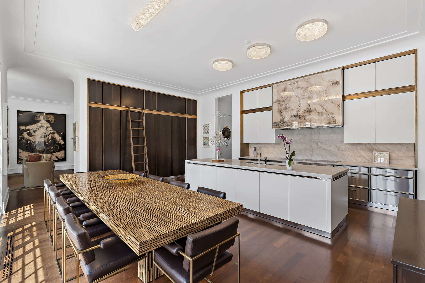 930 Lake Road Lake Forest, IL 60045 - Photo 15 of 51 a kitchen with a table chairs sink and refrigerator