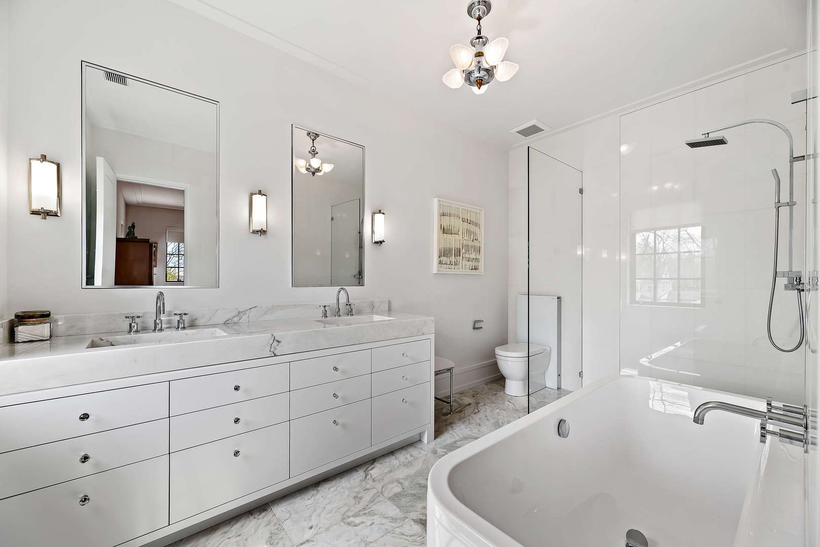 930 Lake Road Lake Forest, IL 60045 - Photo 24 of 51 a spacious bathroom with a double vanity sink a mirror a bathtub and a shower