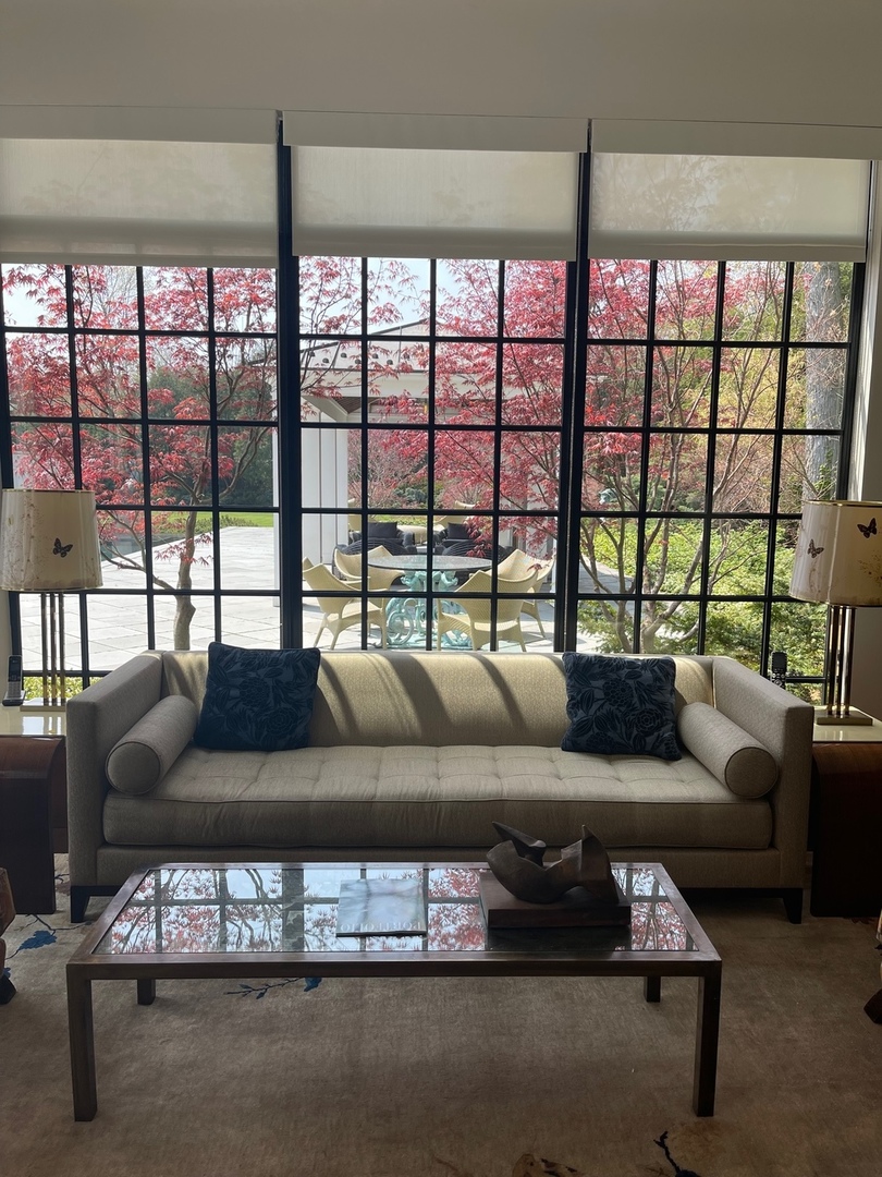 930 Lake Road Lake Forest, IL 60045 - Photo 28 of 51 a living room with furniture and a large window