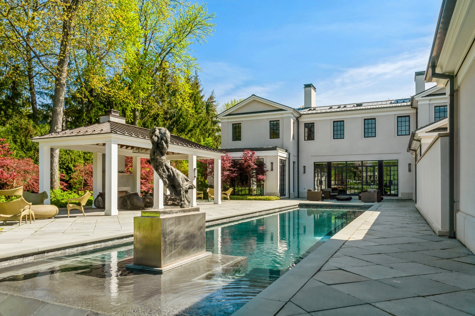 930 Lake Road Lake Forest, IL 60045 - Photo 42 of 51 front view of a house with a swimming pool