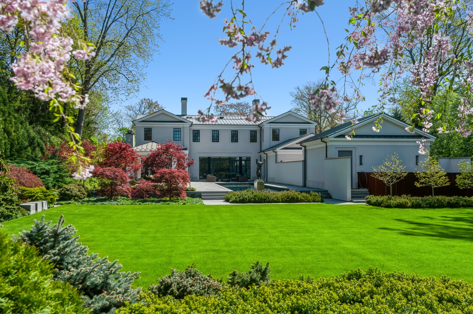 930 Lake Road Lake Forest, IL 60045 - Photo 48 of 51 a front view of house with yard and outdoor seating