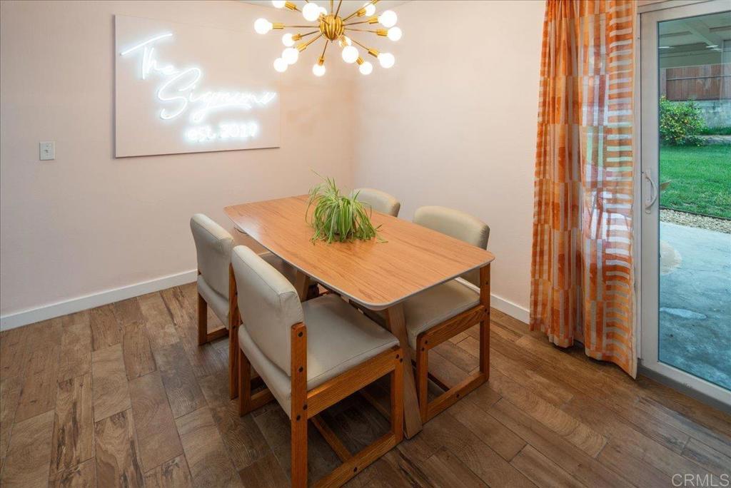 14539 Kennebunk Street Poway, CA 92064 - Photo 11 of 26 a view of a workspace with furniture and window
