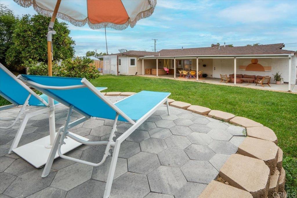 14539 Kennebunk Street Poway, CA 92064 - Photo 4 of 26 a view of a house with a yard and sitting area