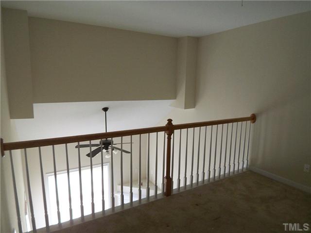 2713 Andover Glen Road Raleigh, NC 27604 - Photo 8 of 11 a view of staircase with railing in it